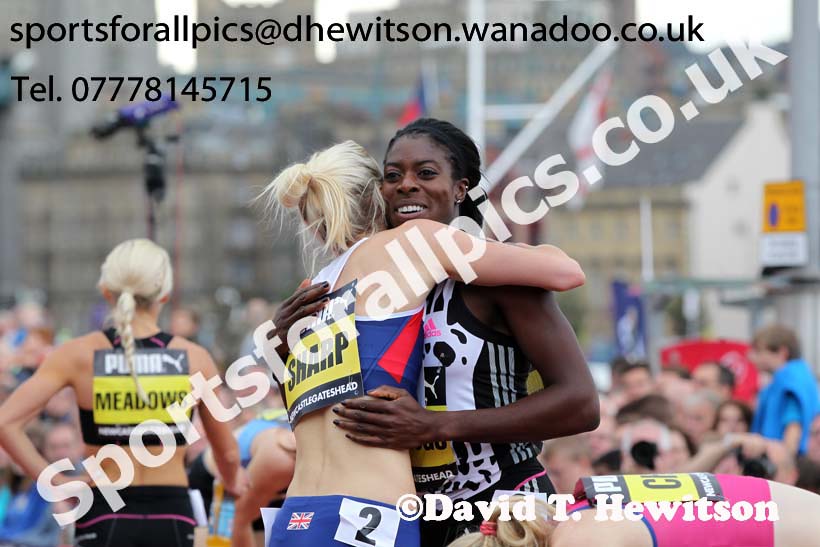 Christine Ohuruogu congratulated by Lynsey Sharp after winning the 500 metres, Great North CityGames. Photo: David T. Hewitson/Sports for All Pics